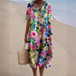 Robe ample à col V, manches courtes, motif floral multicolore sur fond clair