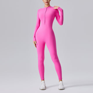 Combinaison de sport rose vif ajustée avec fermeture demi-zip