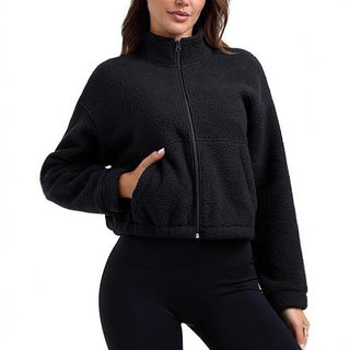 Veste courte en polaire bouclée noire, col montant et fermeture éclair