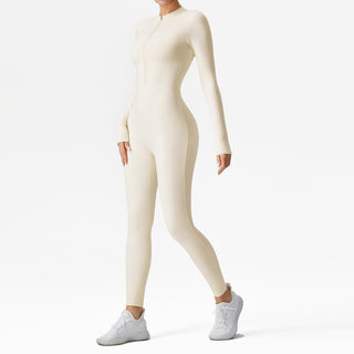 Combinaison de sport crème à manches longues, coupe moulante et demi-zip