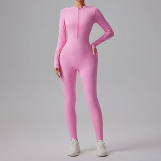 Combinaison de sport rose clair ajustée à manches longues et demi-zip