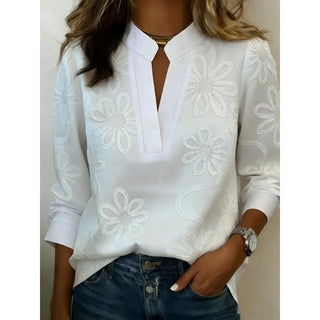 Blouse à col V fendu manches longues blanche, motifs floraux gaufrés