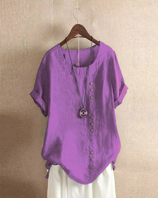 Blouse ample en lin violet, encolure ronde, boutons décoratifs à l’avant et manches courtes