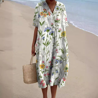 Robe ample à col V, manches courtes, fleurs multicolores sur fond clair