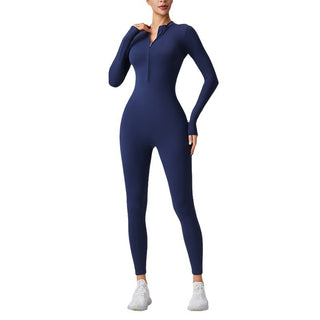 Combinaison de sport bleu marine moulante à manches longues et demi-zip ouvert