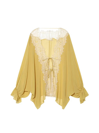 Blouse moutarde vue de face, avec dentelle écrue et liens noués