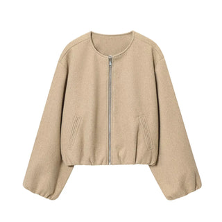 Veste bomber courte en polaire beige, fermeture éclair centrale et poches