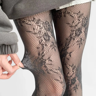 Collants en dentelle pour femme noir, motif floral détaillé sur la jambe