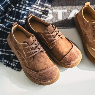 Chaussures en cuir de veau marron à lacets, détails de surpiqûres, bout rond