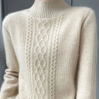 Pull col roulé écru en maille, bandes torsadées et relief devant.