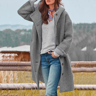 Manteau long en laine gris à boutons, manches longues et poches latérales