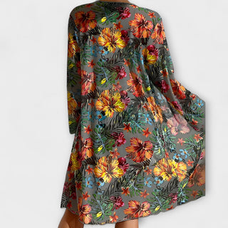 Robe de plage courte à fleurs multicolores, coupe ample, en superposition sur bikini