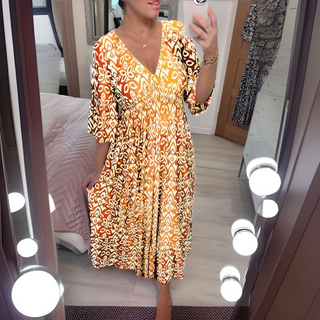 Robe bohème longue à décolleté V, motif orange/jaune, manches trois-quarts