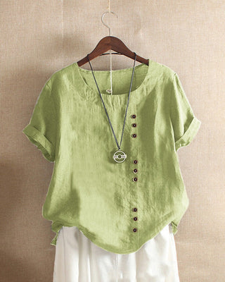 Blouse ample en lin vert menthe, encolure ronde, boutonnage décoratif et manches courtes