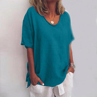 T-shirt ample en lin bleu-vert, encolure dégagée, manches courtes et fentes latérales