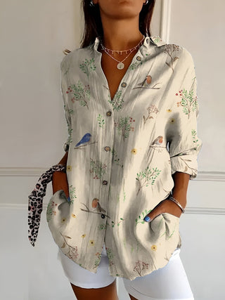 Chemise fluide claire à motifs oiseaux et plantes, encolure boutonnée, manches longues