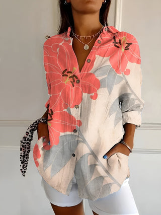 Chemise fluide corail à grandes fleurs, encolure boutonnée, manches longues